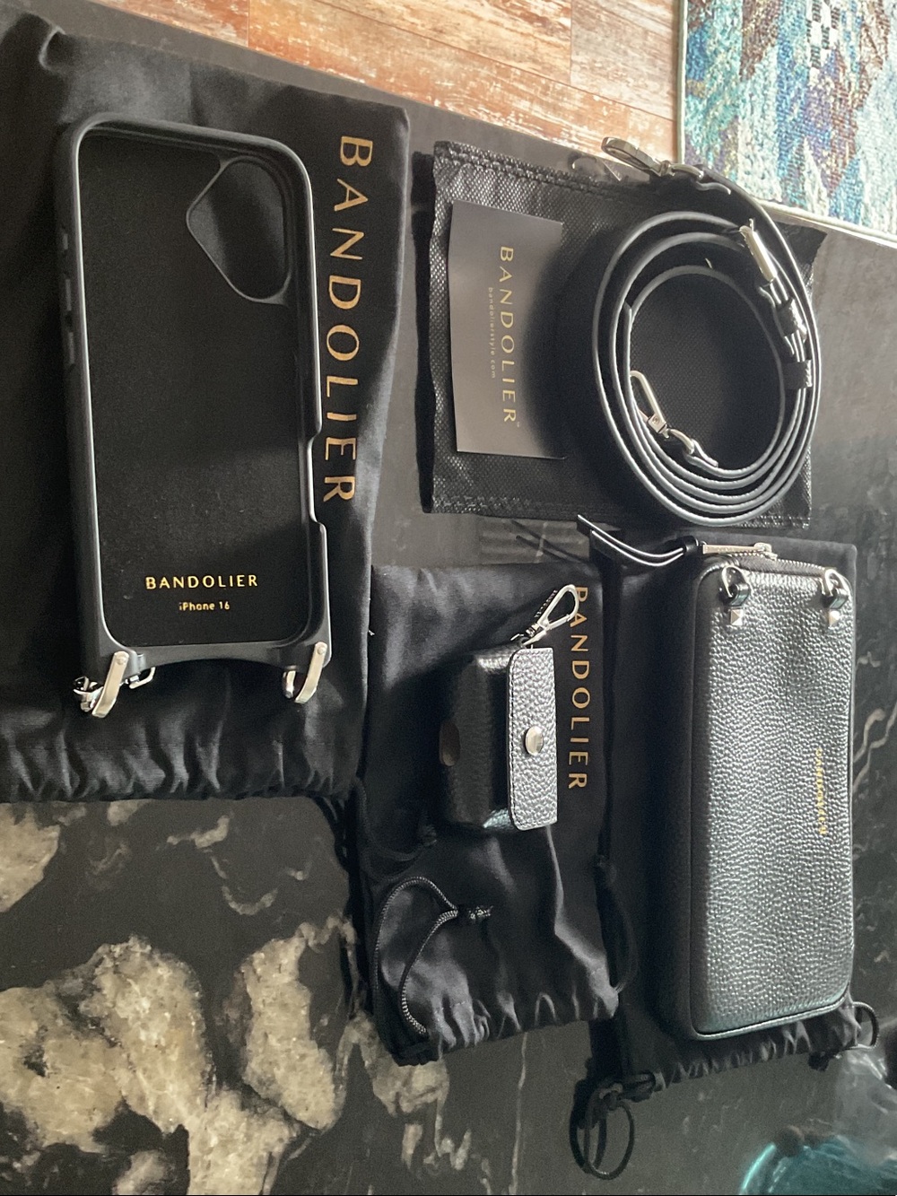 Bandolier Black Leather Crossbody Phone Case with Strap for iPhone 16